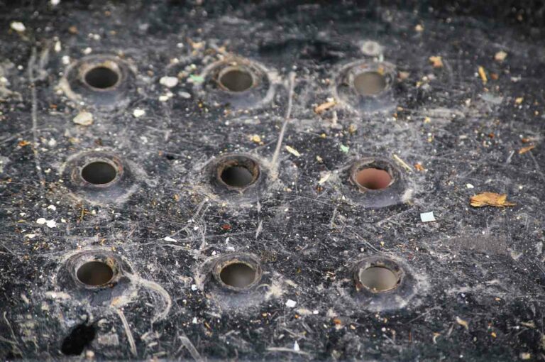 Grunge Black Metal Rivets Texture Stock Photo