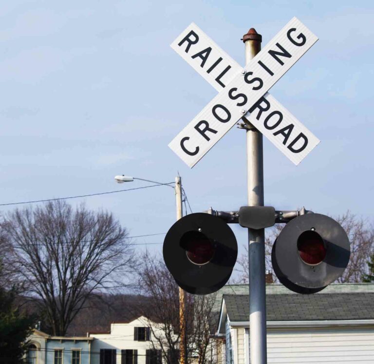 Railroad Crossing Sign in a Small Town