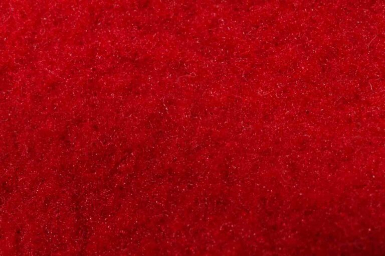 Stock Texture of Red Glittery Felt Background