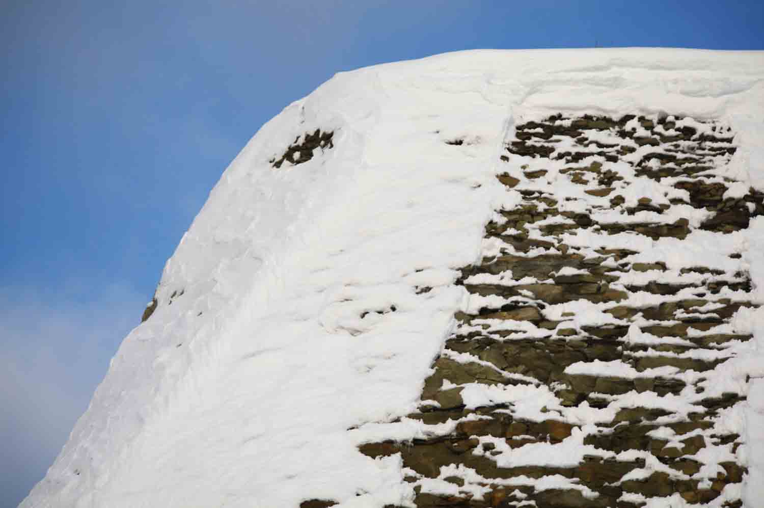 Snowcoveredmountainbluesky