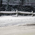 Snowcoveredroadfence